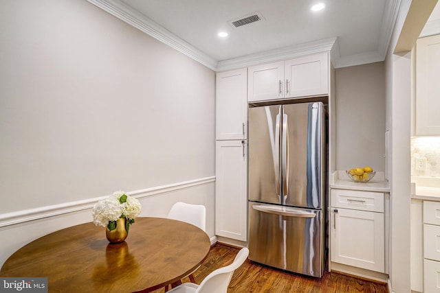 644 S Columbus St, Alexandria, VA 22314 - kitchen with freestanding refrigerator, crown molding, white cabinetry, dark wood finished floors, and recessed lighting