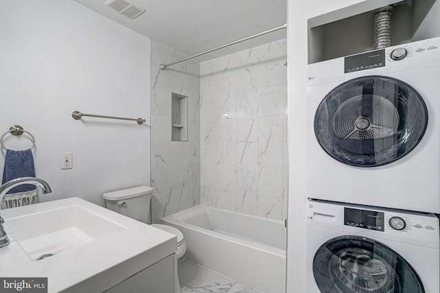 644 S Columbus St, Alexandria, VA 22314 - full bathroom featuring estacked washer and dryer, marble finish flooring, shower / washtub combination, and vanity