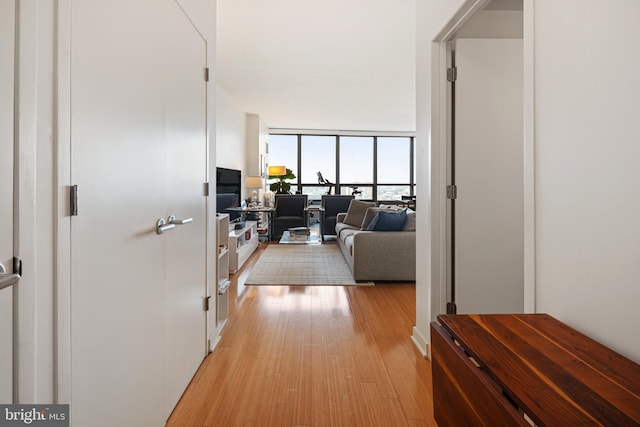 2101 Market St Unit 2801, Philadelphia, PA 19103 - corridor featuring expansive windows and light wood-type flooring
