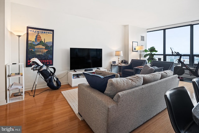 2101 Market St Unit 2801, Philadelphia, PA 19103 - living room featuring wood finished floors and baseboards