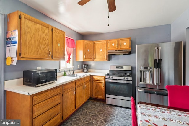 3170 Merriel Ave, Camden, NJ 08105 - kitchen featuring appliances with stainless steel finishes, under cabinet range hood, light countertops, and ceiling fan