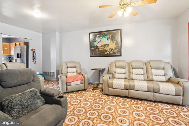 3170 Merriel Ave, Camden, NJ 08105 - living room with a ceiling fan and baseboards