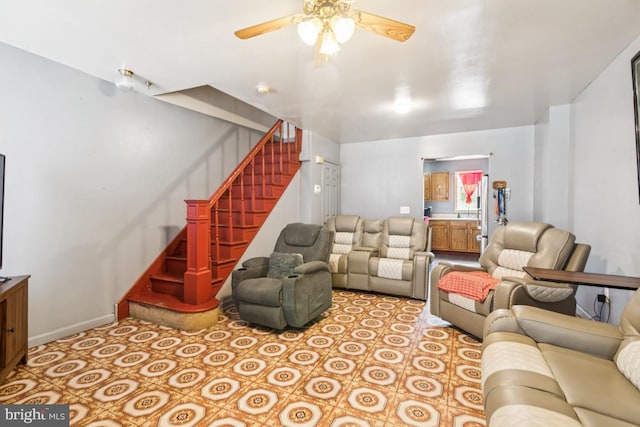 3170 Merriel Ave, Camden, NJ 08105 - living area with ceiling fan and stairs