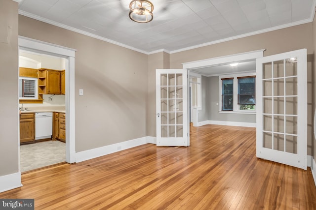 32 W Willow St, Carlisle, PA 17013 - unfurnished room featuring french doors, light wood-style floors, and crown molding