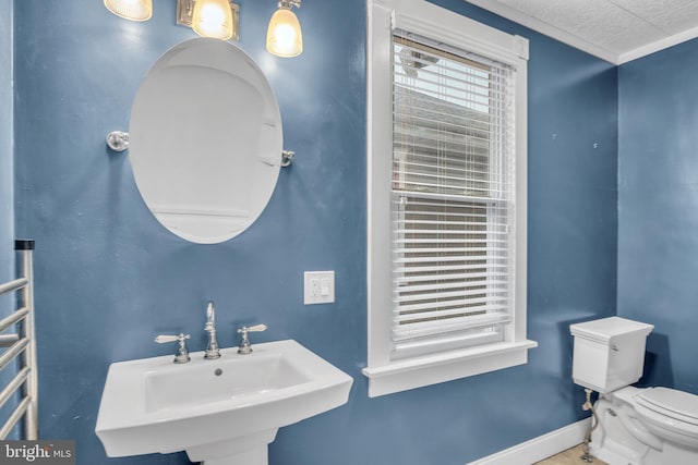 32 W Willow St, Carlisle, PA 17013 - half bathroom featuring a sink and a towel warming rack