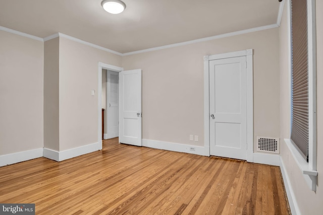 32 W Willow St, Carlisle, PA 17013 - unfurnished bedroom with light wood-style floors and ornamental molding