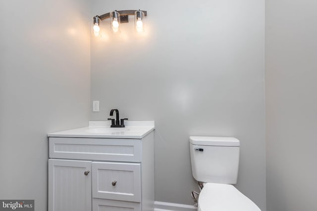1715 E Oliver St, Baltimore, MD 21213 - bathroom featuring toilet and vanity