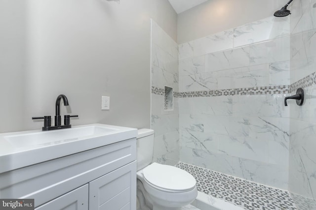 1715 E Oliver St, Baltimore, MD 21213 - bathroom featuring tiled shower and vanity