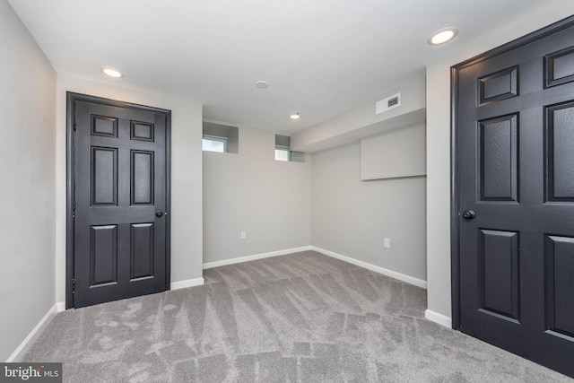 1715 E Oliver St, Baltimore, MD 21213 - basement featuring carpet floors and recessed lighting