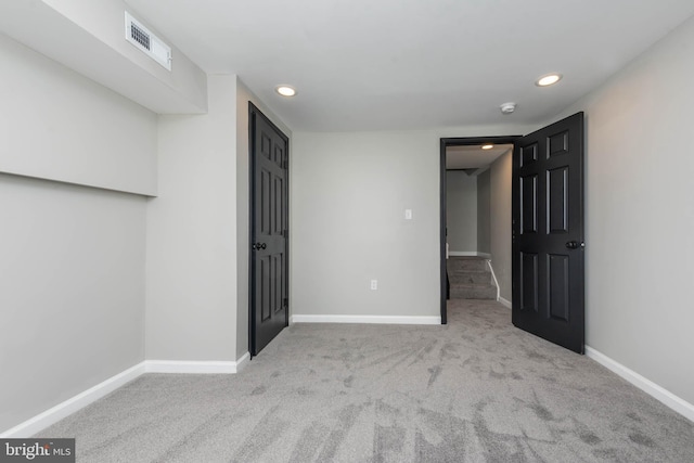 1715 E Oliver St, Baltimore, MD 21213 - unfurnished bedroom with carpet flooring and recessed lighting