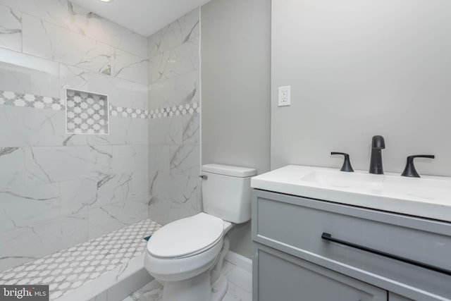 1715 E Oliver St, Baltimore, MD 21213 - full bath featuring vanity, marble finish floors, and tiled shower