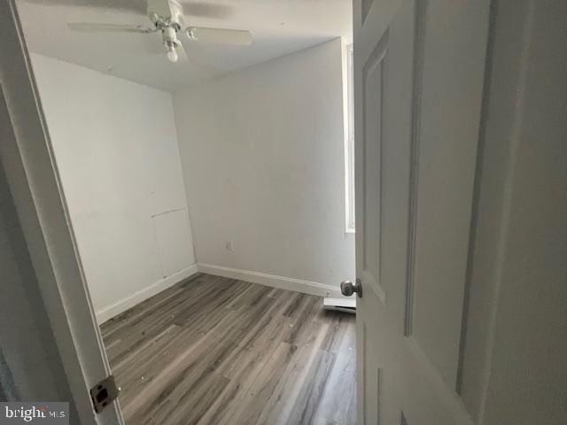 2521 N 12th St, Philadelphia, PA 19133 - empty room with wood finished floors and a ceiling fan