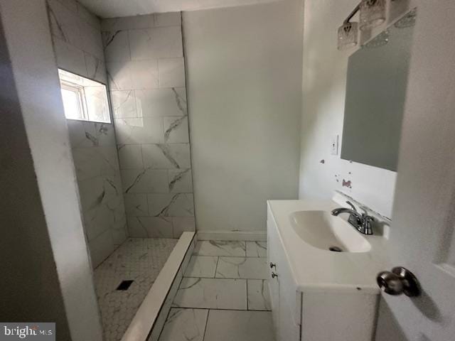 2521 N 12th St, Philadelphia, PA 19133 - full bathroom with marble look tiles, vanity, and tiled shower