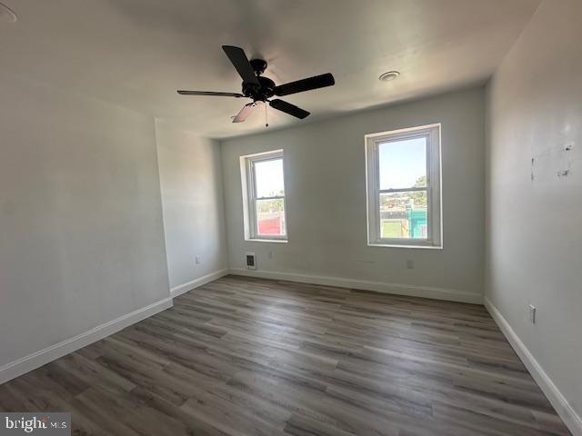 2521 N 12th St, Philadelphia, PA 19133 - empty room featuring wood finished floors and ceiling fan