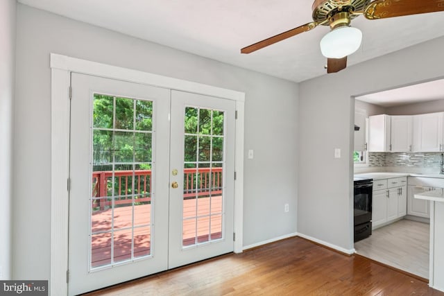 9405 Loughran Rd, Fort Washington, MD 20744 - doorway to outside featuring light wood-style flooring, ceiling fan, and french doors
