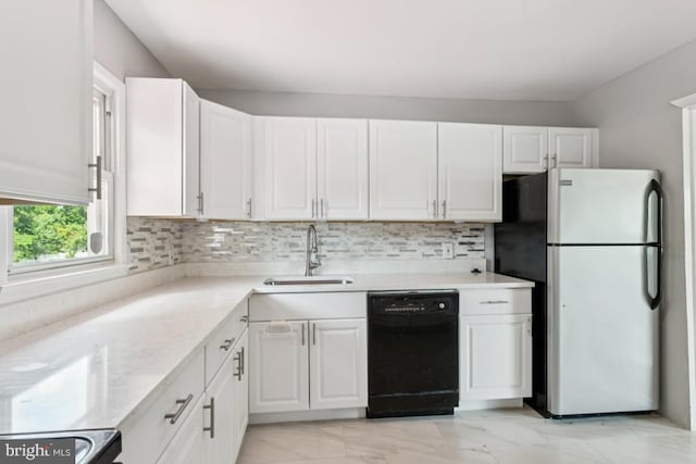 9405 Loughran Rd, Fort Washington, MD 20744 - kitchen featuring black dishwasher, freestanding refrigerator, and white cabinets