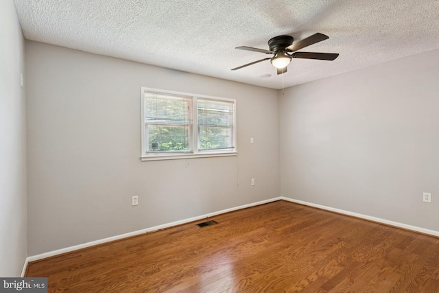 9405 Loughran Rd, Fort Washington, MD 20744 - unfurnished room with ceiling fan, wood finished floors, and a textured ceiling