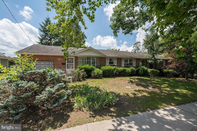 3221 Union Ave, Pennsauken, NJ 08109 - ranch-style home with brick siding and a front yard