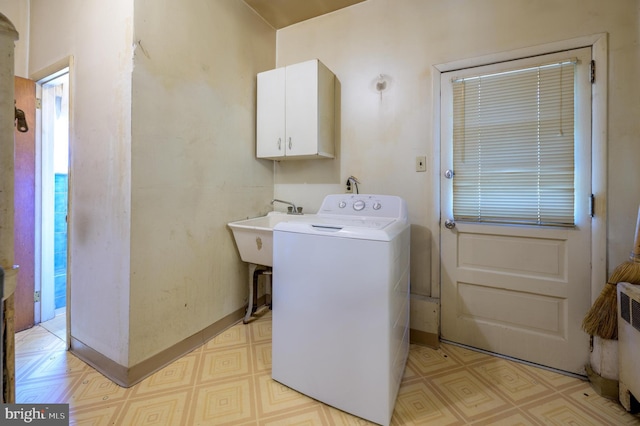 3221 Union Ave, Pennsauken, NJ 08109 - washroom with washer / dryer, cabinet space, light flooring, and radiator