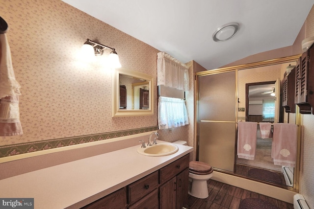 110 Schoolhouse Rd, Sykesville, MD 21784 - bathroom featuring wallpapered walls, baseboard heating, vanity, a stall shower, and vaulted ceiling