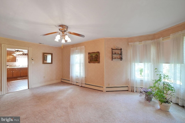 110 Schoolhouse Rd, Sykesville, MD 21784 - spare room with carpet, a baseboard heating unit, ceiling fan, and healthy amount of natural light