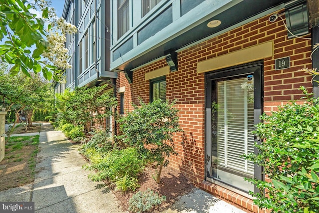 19 Yogurt Ln, Baltimore, MD 21231 - doorway to property featuring brick siding