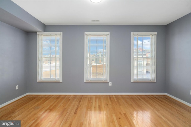 19 Yogurt Ln, Baltimore, MD 21231 - empty room with wood finished floors and baseboards