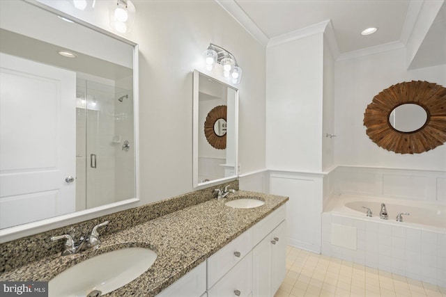 19 Yogurt Ln, Baltimore, MD 21231 - full bathroom featuring ornamental molding, a shower stall, double vanity, tile patterned flooring, and a garden tub