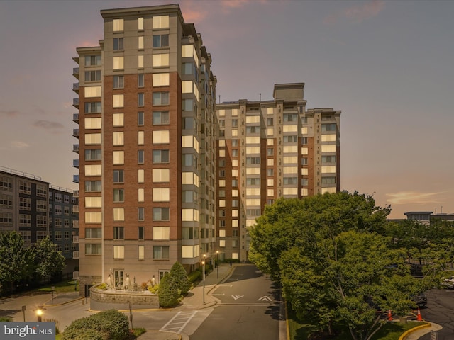 2726 Gallows Rd Unit 411, Vienna, VA 22180 - property at dusk with a view of apartment building / complex