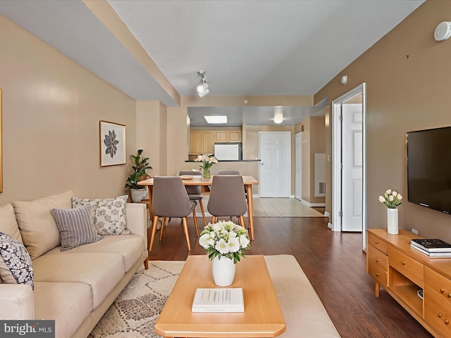 2726 Gallows Rd Unit 411, Vienna, VA 22180 - living room with dark wood-style flooring