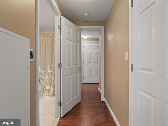 2726 Gallows Rd Unit 411, Vienna, VA 22180 - hall with dark wood-style flooring and baseboards