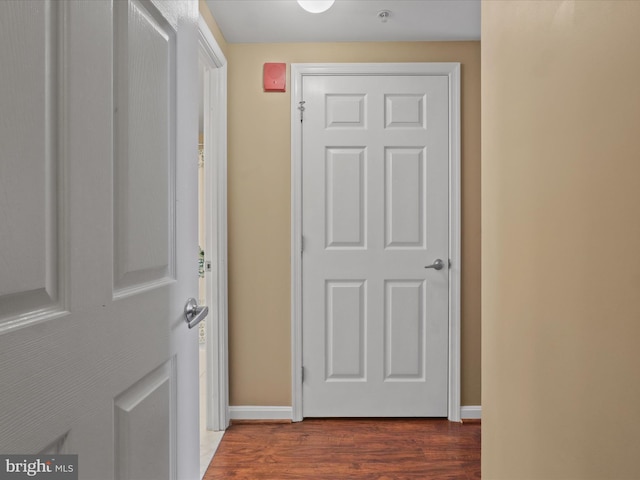 2726 Gallows Rd Unit 411, Vienna, VA 22180 - hall with dark wood-style flooring and baseboards