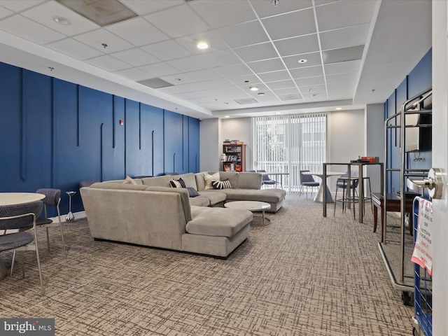 2726 Gallows Rd Unit 411, Vienna, VA 22180 - carpeted living room featuring a paneled ceiling and a raised ceiling
