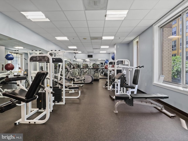 2726 Gallows Rd Unit 411, Vienna, VA 22180 - workout area featuring a drop ceiling and baseboards