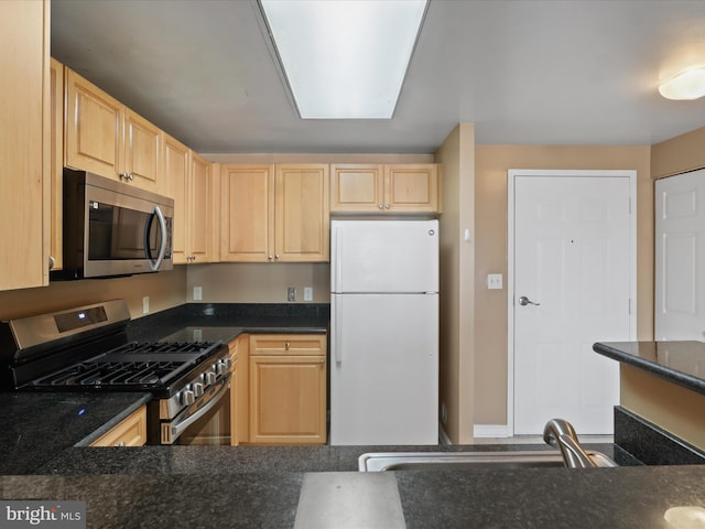 2726 Gallows Rd Unit 411, Vienna, VA 22180 - kitchen featuring stainless steel appliances and light brown cabinetry