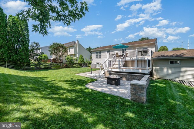 9523 Hickory Falls Way, Baltimore, MD 21236 - rear view of house with a patio, a wooden deck, and a fire pit