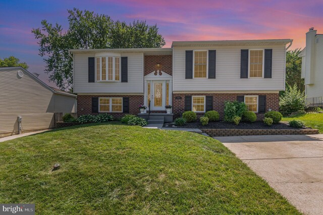 9523 Hickory Falls Way, Baltimore, MD 21236 - split foyer home featuring brick siding and a lawn