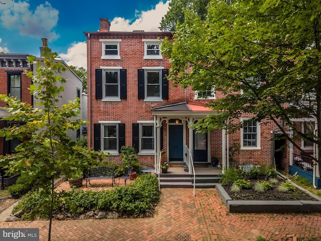 239 W Barnard St, West Chester, PA 19382 - view of front of property with brick siding and a chimney
