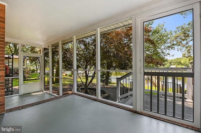 10 Sonora Dr, Pasadena, MD 21122 - unfurnished sunroom with a water view