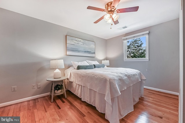10 Sonora Dr, Pasadena, MD 21122 - bedroom featuring light wood finished floors and ceiling fan