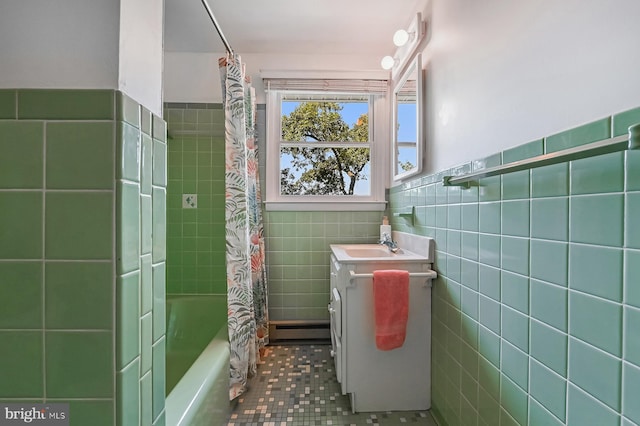 10 Sonora Dr, Pasadena, MD 21122 - full bath featuring vanity, tile walls, shower / bath combination with curtain, tile patterned flooring, and baseboard heating