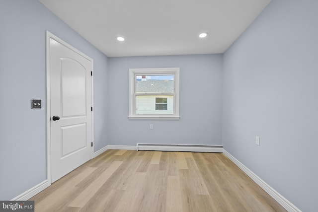 321 Curacao St, Toms River, NJ 08757 - unfurnished room with a baseboard radiator, light wood-style flooring, and recessed lighting