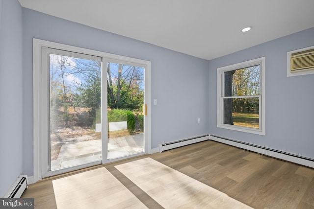 321 Curacao St, Toms River, NJ 08757 - unfurnished room featuring a baseboard radiator, plenty of natural light, light wood-style floors, and recessed lighting