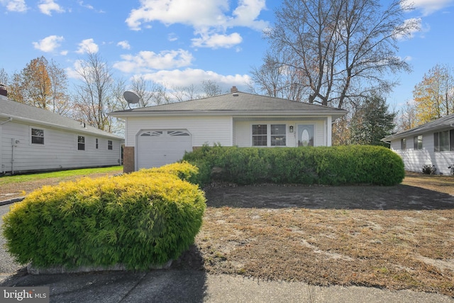 321 Curacao St, Toms River, NJ 08757 - view of front of home featuring a garage and a chimney