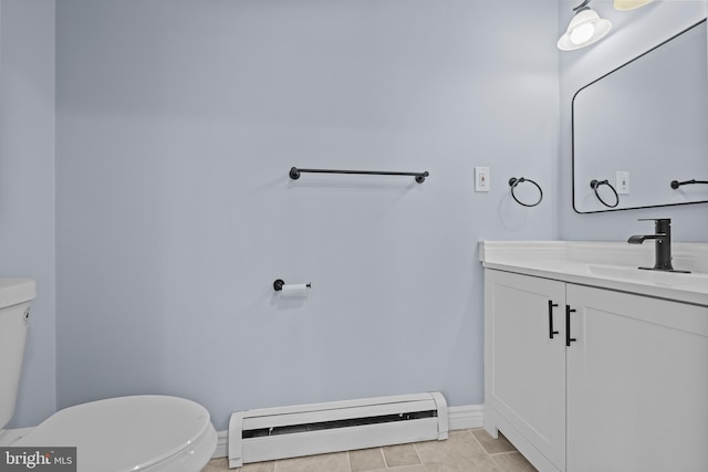 321 Curacao St, Toms River, NJ 08757 - half bathroom with baseboard heating, vanity, and tile patterned floors