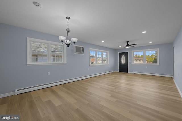 321 Curacao St, Toms River, NJ 08757 - unfurnished living room featuring a baseboard heating unit, a baseboard radiator, healthy amount of natural light, a wall mounted AC, and recessed lighting