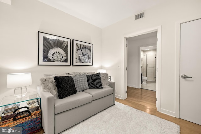 1010 Massachusetts Ave NW Unit 706, Washington, DC 20001 - living room featuring wood finished floors and baseboards