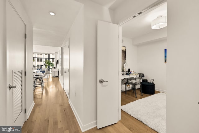 1010 Massachusetts Ave NW Unit 706, Washington, DC 20001 - hall featuring light wood-style floors, an office area, and recessed lighting