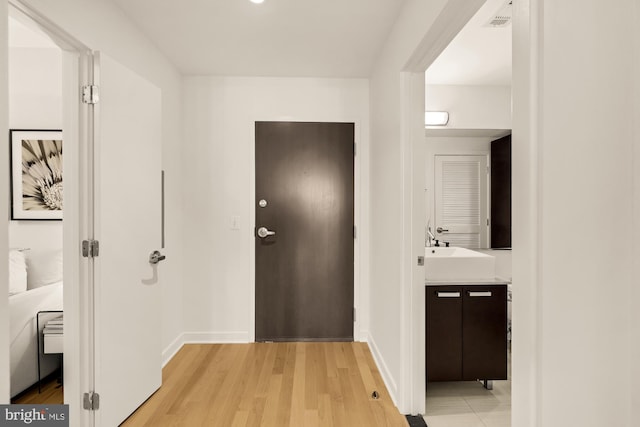 1010 Massachusetts Ave NW Unit 706, Washington, DC 20001 - hall featuring light wood-style flooring