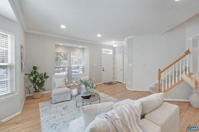834 Rock Creek Rd, Charlottesville, VA 22903 - living room featuring stairs, light wood-style flooring, ornamental molding, and recessed lighting